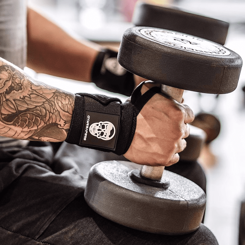 Alt Text 3: Bande de poignet de musculation avec motif de crâne rouge pour une performance optimale