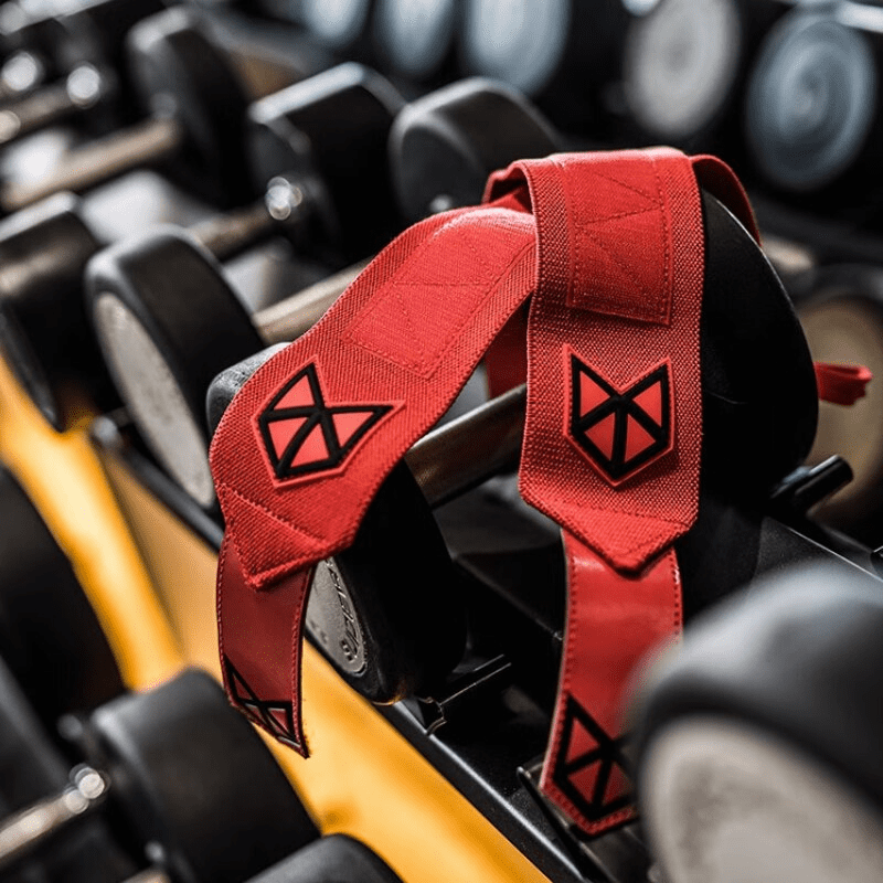 Vue détaillée des Bandes de Poignet Musculation Rouges montrant leur matériel de haute qualité.