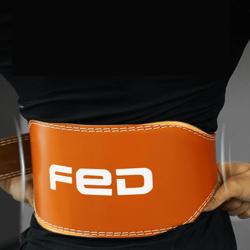 "Ceinture de musculation orange ajoutant une énergie vibrante à votre séance de gym"