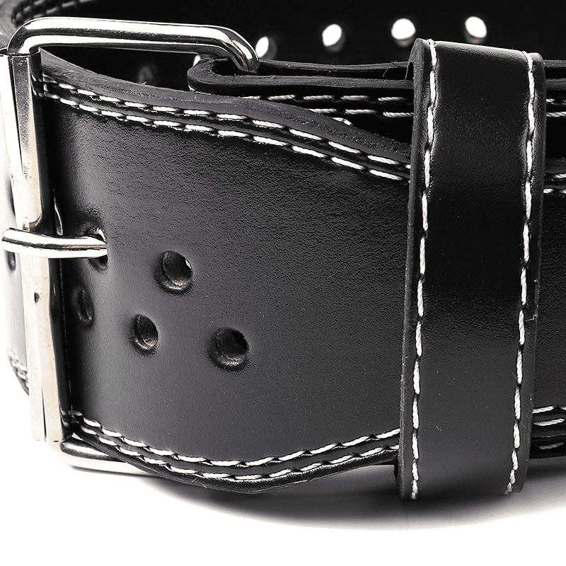 "La ceinture de musculation Night Prowler posée à plat sur une surface noire."