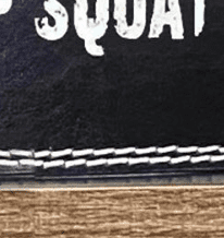 "Close-up de la ceinture de musculation Squat Noire SHUT UP SQUAT montrant les détails du cuir PU"