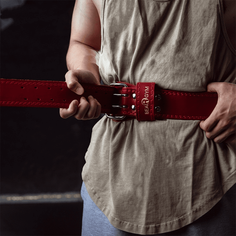 "Vue détaillée de la Ceinture Musculation Ours Rouge."