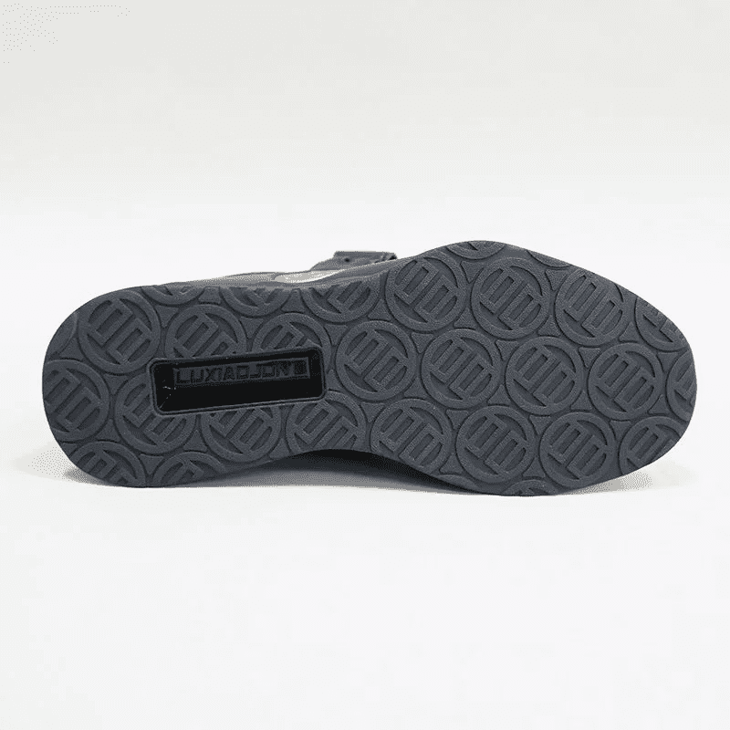 "Chaussures noires de squat pour hommes et femmes, support maximal."