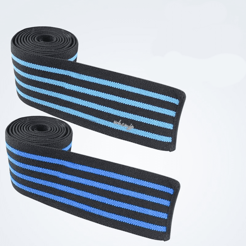 Coudière de musculation de couleur bleu royal, idéale pour soutenir le coude lors des séances d'entraînement intensives.