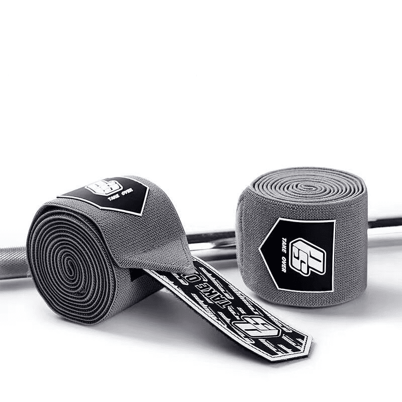Alt Text: Coudière Musculation Gris offrant un soutien essentiel pour les activités de musculation, avec un design élégant.