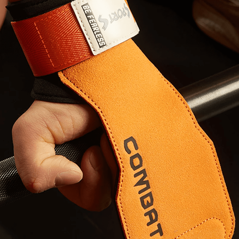 "Gants de protection pour la gym, offrant un grip ferme en couleur orange."