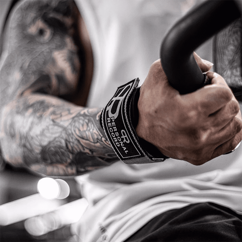 "Sangle de poignet PR en couleur vive, alliant esthétique moderne et soutien musculaire efficace."