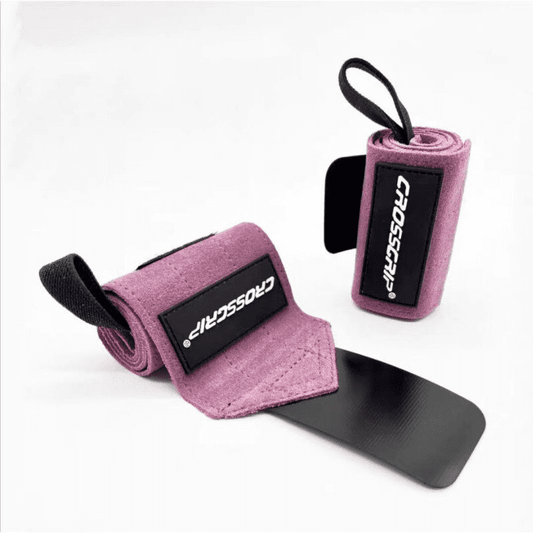 Bande de poignet rose alliant style et soutien pour un entraînement efficace.