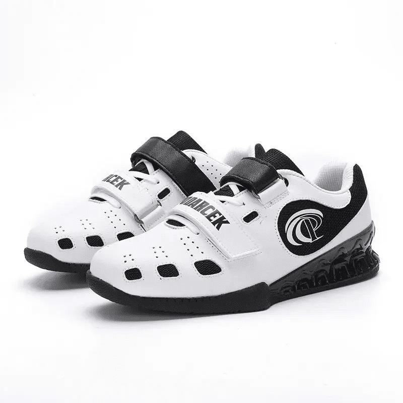 "Chaussures d'haltérophilie blanches, idéales pour la performance en levage."