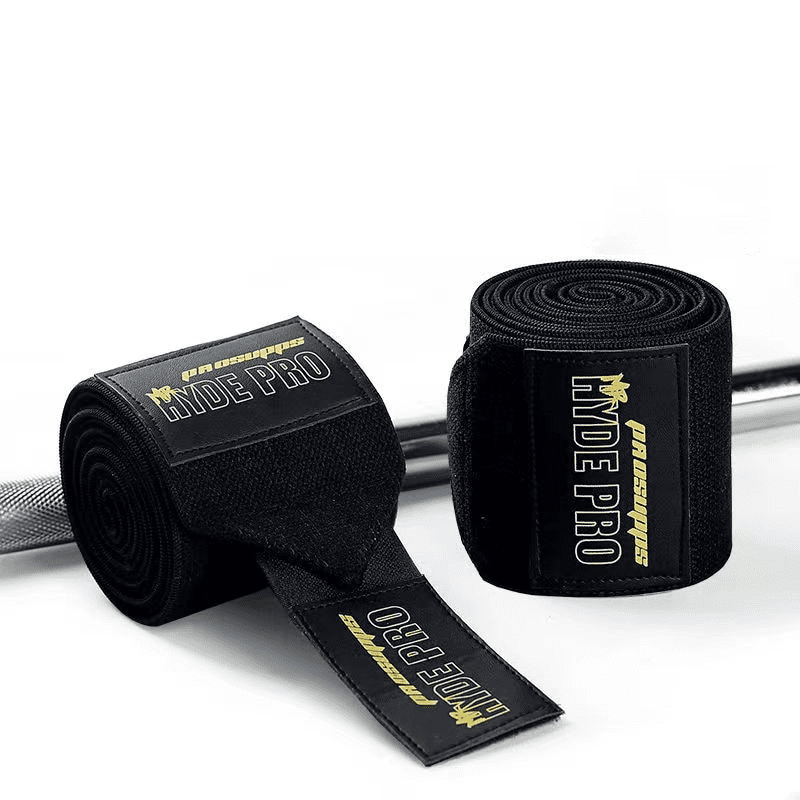 Alt Texte : Coudière musculation Max-Comfort, en couleur noir et rouge, pour un support optimal pendant l'entraînement.