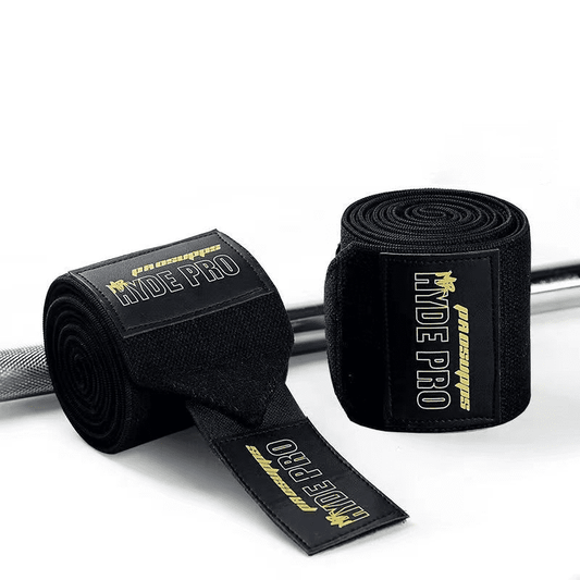 Alt Texte : Coudière musculation Max-Comfort, en couleur noir et rouge, pour un support optimal pendant l'entraînement.