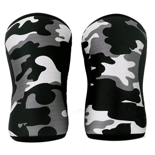 Genouillère Crossfit Gris conçue pour offrir un soutien optimal, fabriquée avec des matériaux de première qualité et présentant une couleur grise élégante pour une performance et un style parfaits lors des entraînements.